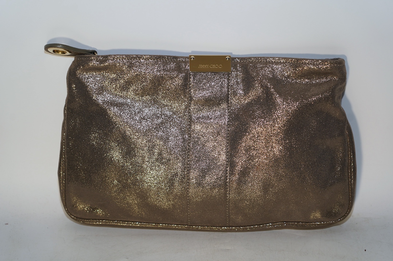 A Jimmy Choo metallic gold clutch bag, with dust bag